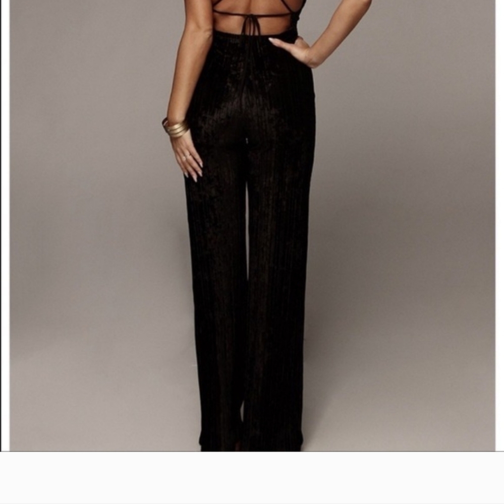 Jlux label black velvet jumpsuit. NWT. Size small
